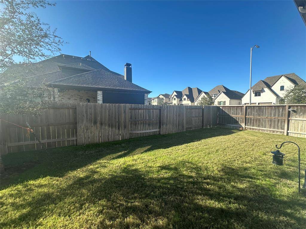 Come and see this spacious backyard. Perfect for your outdoor living space and so much more. The possibilities are endless!
