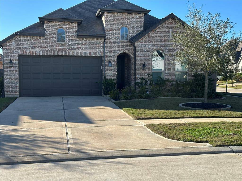 Welcome home to 4623 Sweet Dewberry Lane located on a corner lot on a quiet cul-de-sac street in Fulbrook on Fulshear Creek and zoned to Lamar Consolidated ISD! This stunning home has lovely curb appeal, a well-manicured lawn, beautiful landscaping, brick elevation, dark stained front door with glass detailing, covered front porch, traditional style, beautiful outdoor lanterns and a double wide driveway!