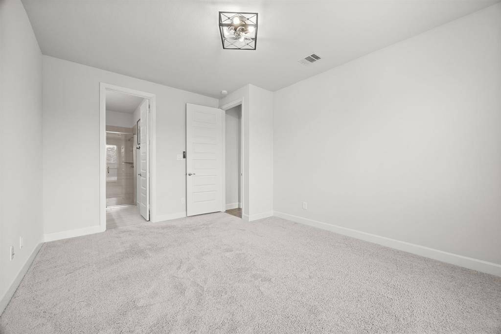 2nd Bedroom off the kitchen area with full bathroom.