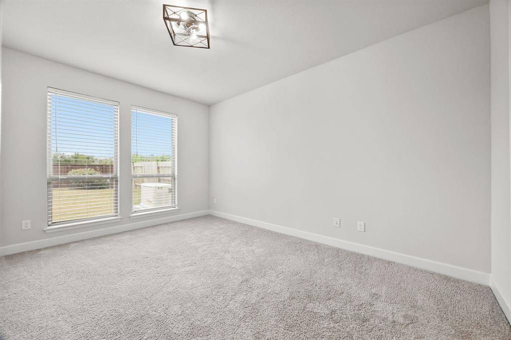 2nd Bedroom off the kitchen area with full bathroom.