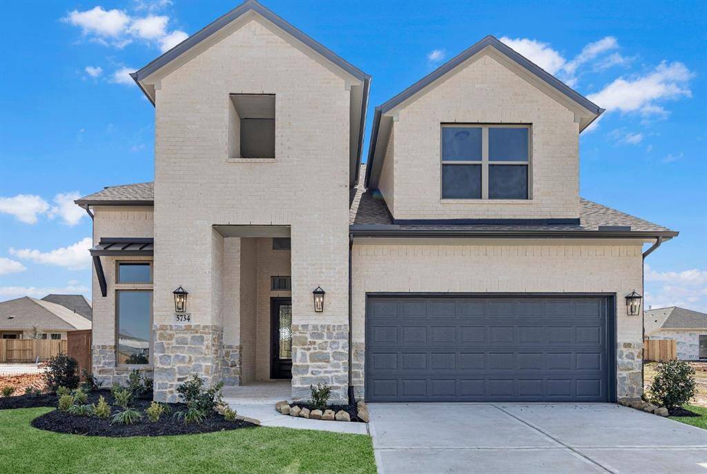 MOVE IN READY!! Westin Homes NEW Construction (Ellington III, Elevation B). Two story. 4 bedrooms. 3.5 baths. Green grass added to enhance photo.