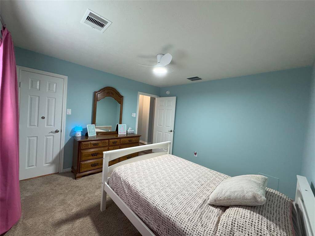 Second bedroom with walk in closet.