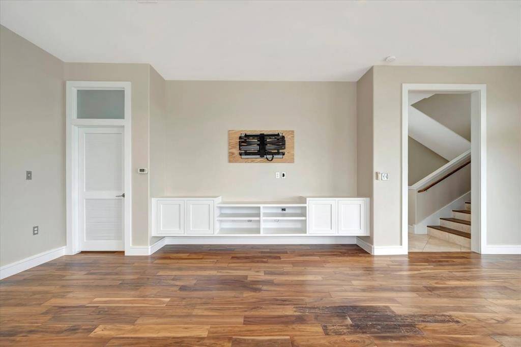 Nice walk-in pantry with solid wood shelving
