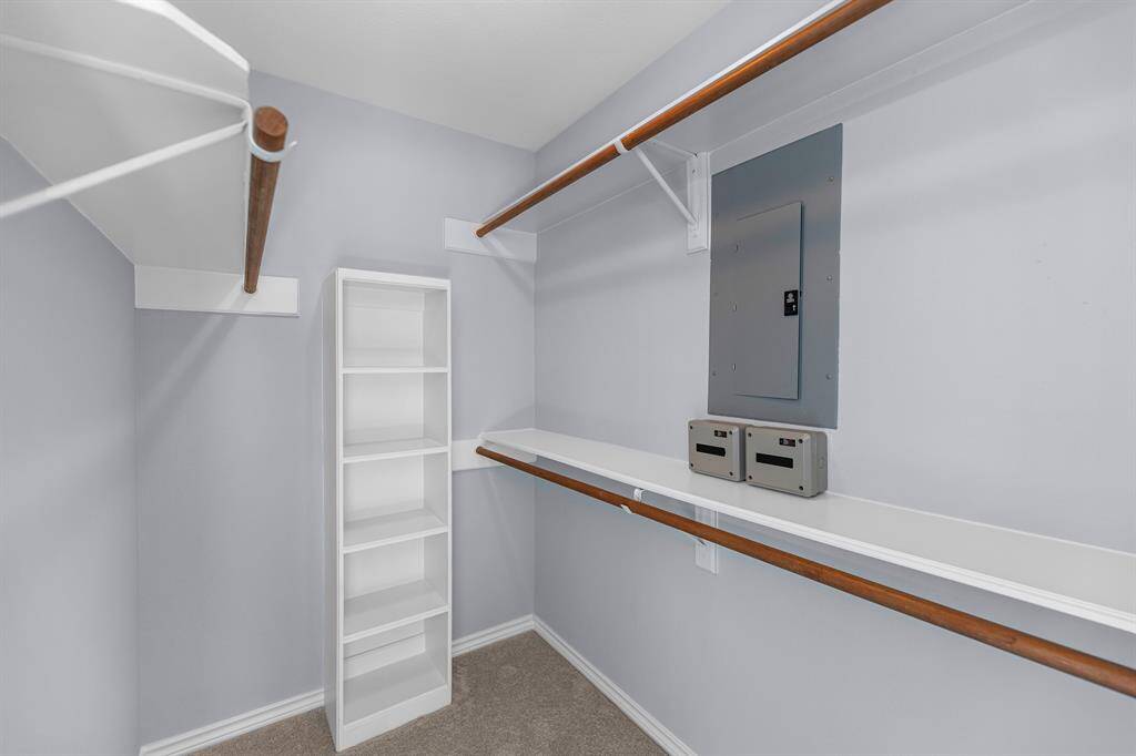 The best parts of the primary bedroom are the TWO Texas sized walk in closets.