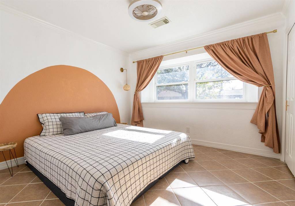 Lots of window space.  Front bedroom.
