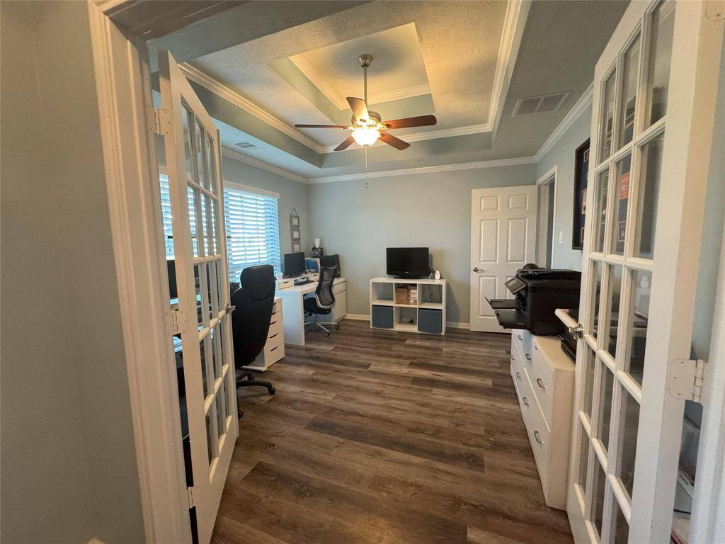 Study with tray ceiling, could also be used as a formal dining room.