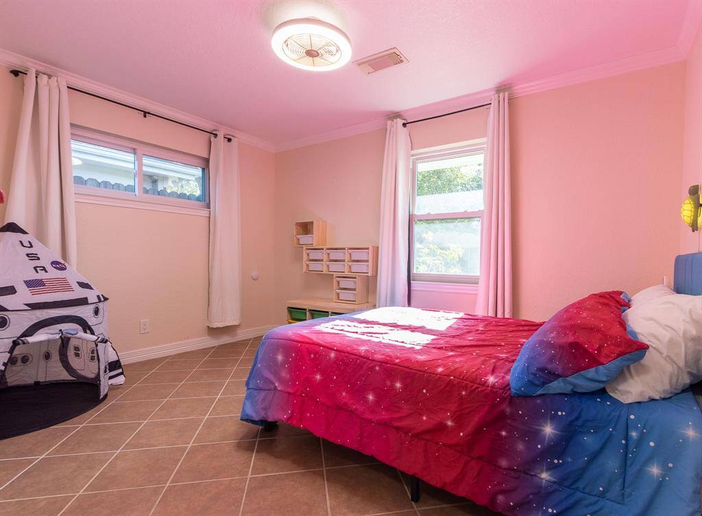 Great child's room.  Crown molding and baseboards. Shelving exempt from the sale. Please review the prepared Non-Realty Addendum.