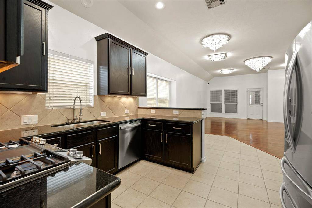 living/ breakfast area with staged furniture