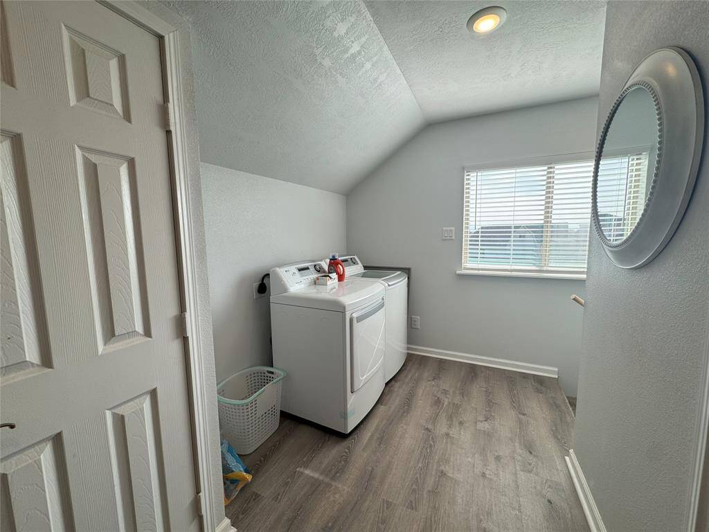 Garage apartment laundry area.