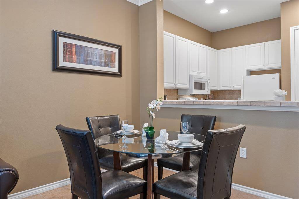Nook area is a great flex space for office or dining table. 4 barstools also fit great in the space