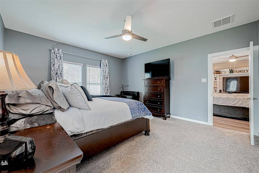 Another view of downstairs primary bedroom.