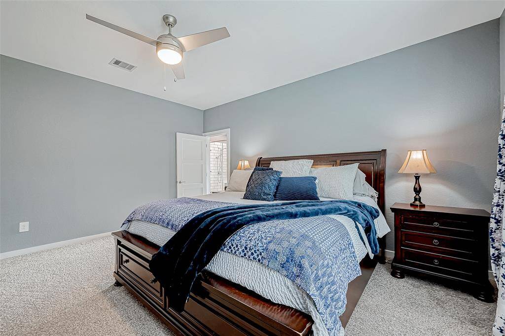 Another view of the primary bedroom.