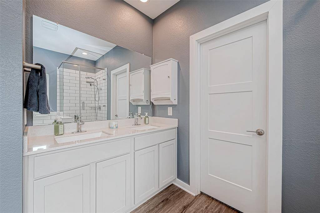 Dual vanities in the primary bathroom.