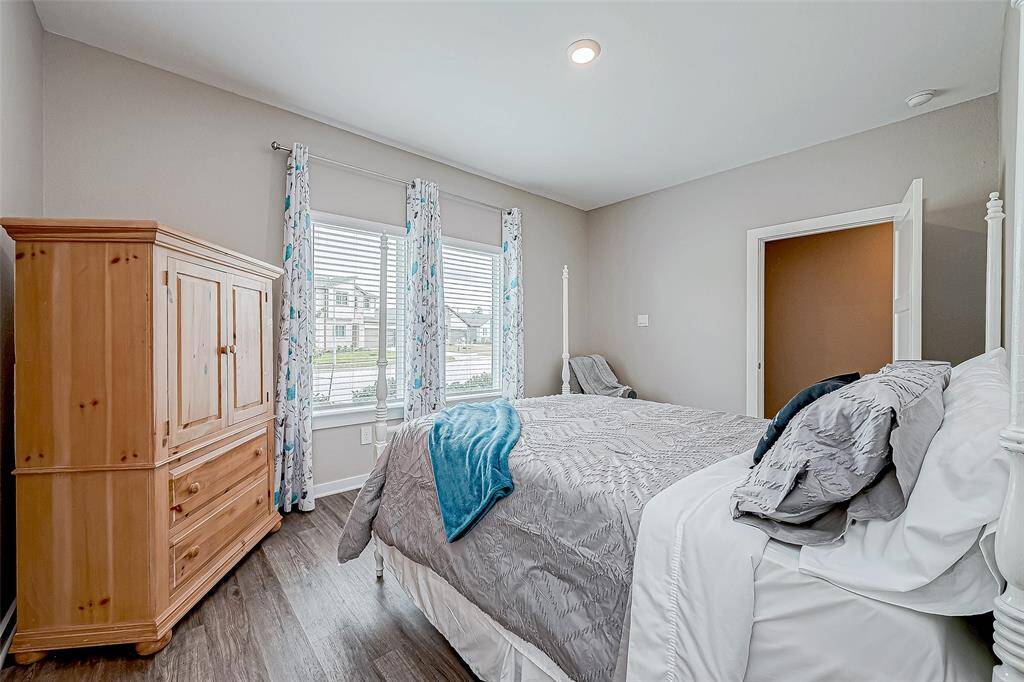 Another view of the first of 3 additional secondary bedrooms in the home.