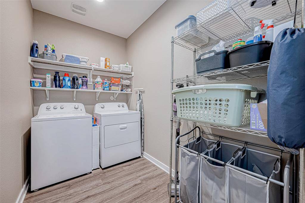 Spacious utility room conveniently located off the kitchen.