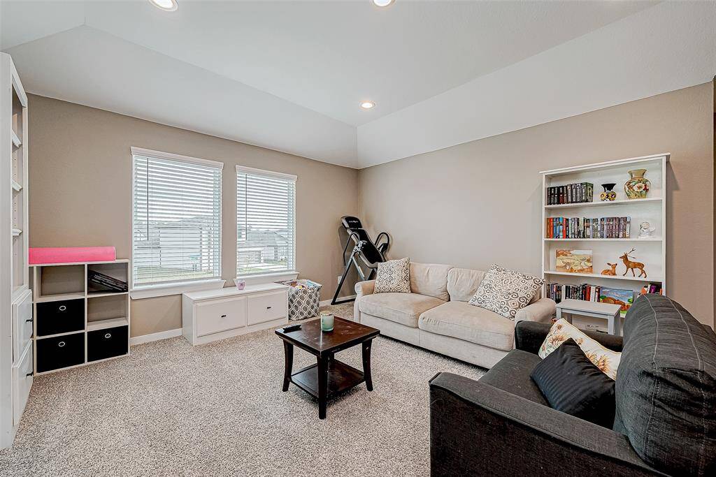 Step onto the second floor and enjoy the spacious, light-filled game room.
