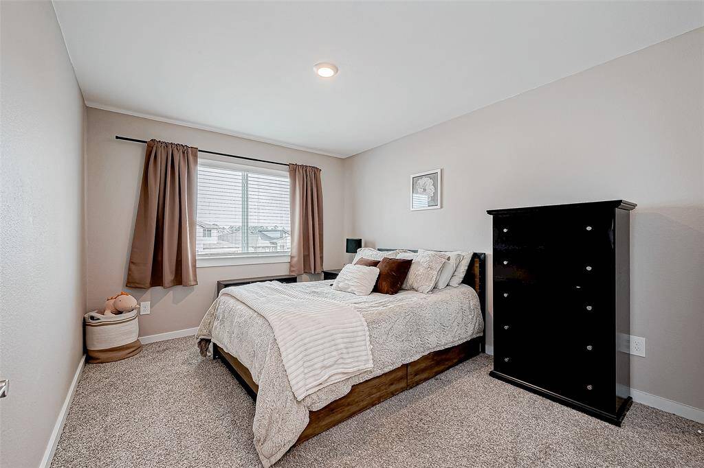 Third upstairs bedroom.