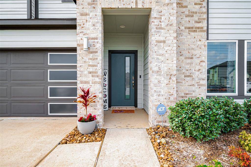 Welcome to your new home, featuring a modern entryway that blends style and warmth.