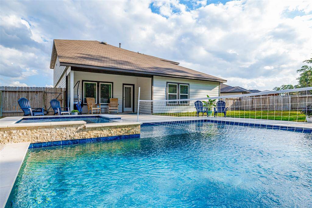 Enjoy your own private oasis in a spacious backyard, ideal for intimate retreats and lively summer gatherings.
