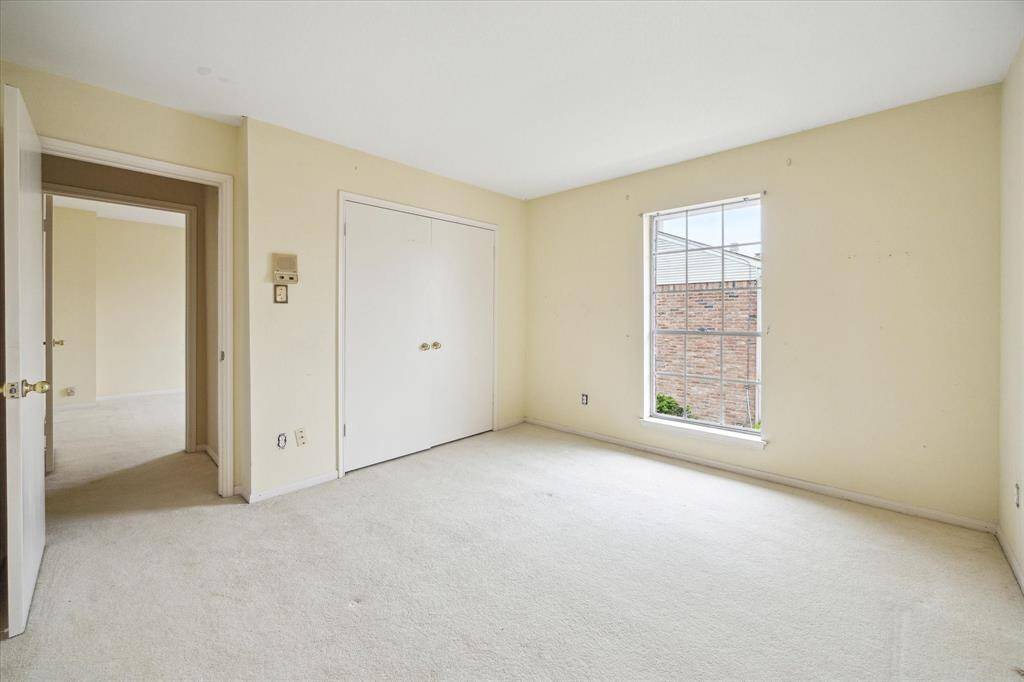 Bright and welcoming guest bedroom with plenty of space to make visitors feel right at home.