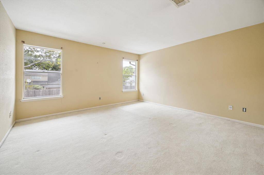With ample space and a calming ambiance, the primary bedroom offers a perfect retreat at the end of the day.