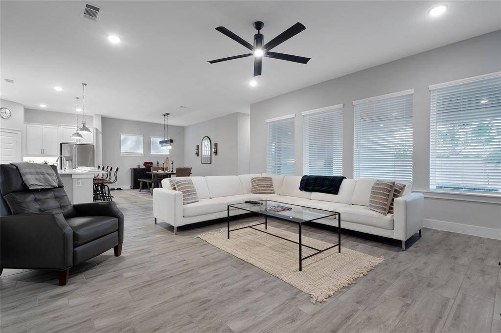 The living space has enough room for any configuration of furniture that you might have and seamlessly flows into the rest of the home.