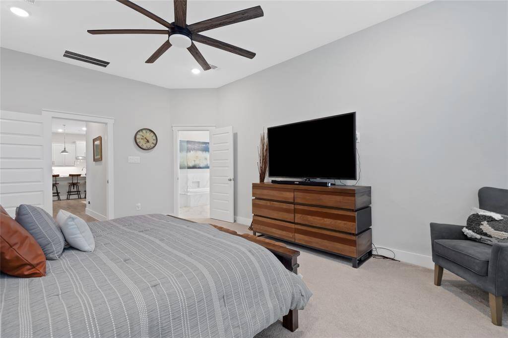 Just another view of the primary suite that is located in the back of the he house and private.