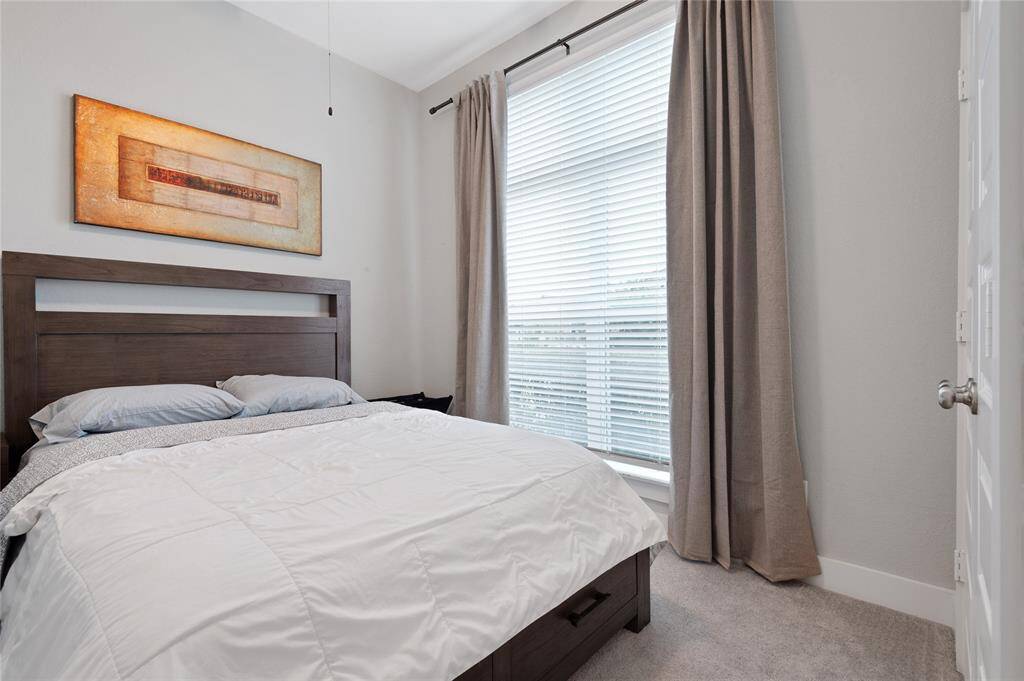 One of the secondary bedrooms, lovely closet and storage space in the whole home.