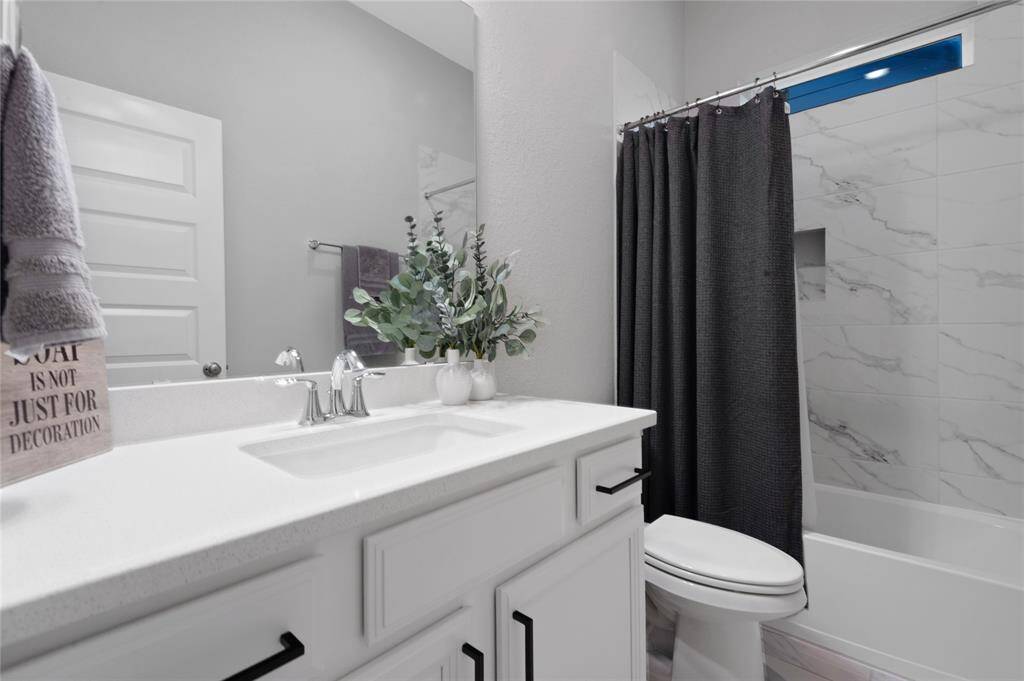 Main bathroom has the same refreshing stylish finishes and terrific storage as well.