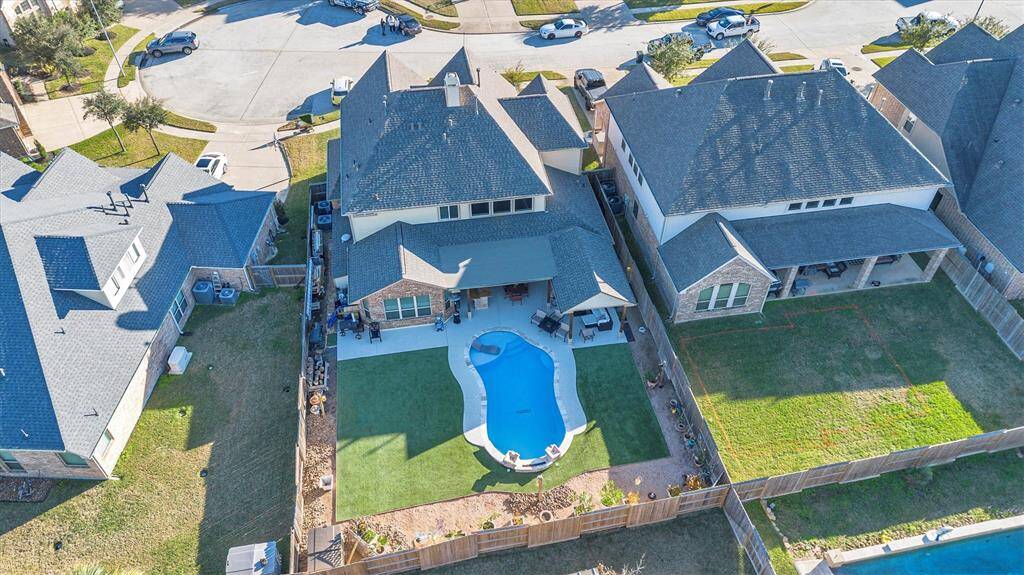 Discover this charming two-story home with a private backyard oasis, featuring a uniquely shaped pool and covered patio. Nestled in a pristine suburban neighborhood, enjoy the fenced privacy and beautifully manicured surroundings.