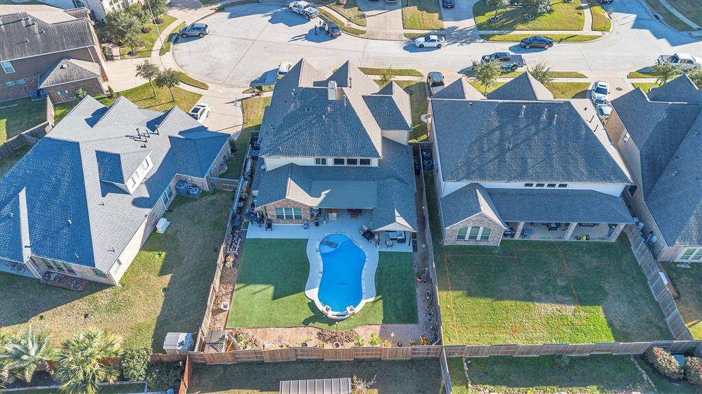 Explore this spacious suburban home nestled in a peaceful cul-de-sac. Enjoy a uniquely shaped pool in a fenced backyard with a beautifully landscaped lawn. Surrounded by well-maintained properties, this serene neighborhood offers the perfect retreat.