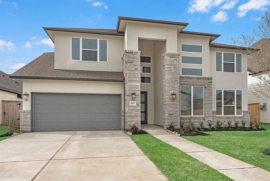 MOVE IN READY!! Westin Homes NEW Construction (Cooper, Elevation B) Two story. 5 bedrooms, 4.5 baths. Green grass added to enhance photo.