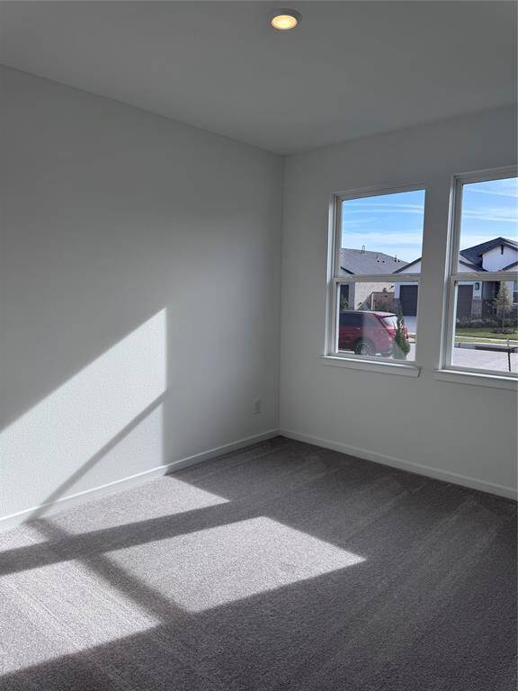 Structural options added include: 12" pop-up ceiling at great room and covered outdoor living.
