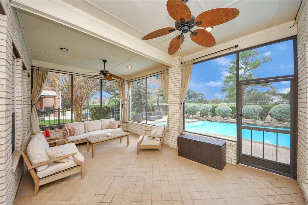 Enjoy your morning coffee in this screened in porch.