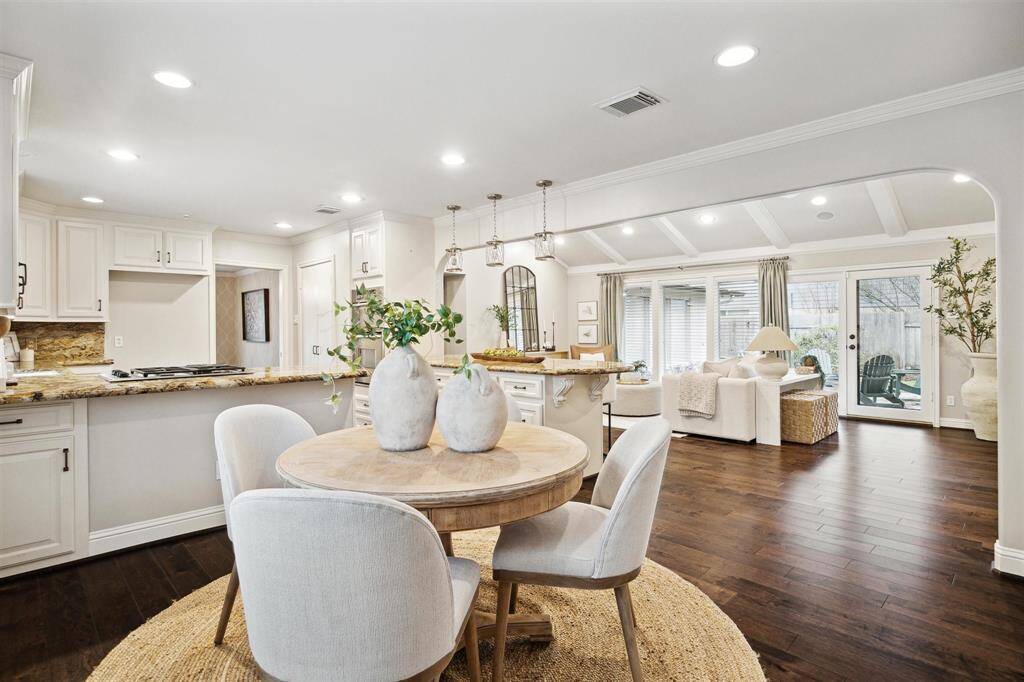 Breakfast nook looking into formal living, backyard and beyond