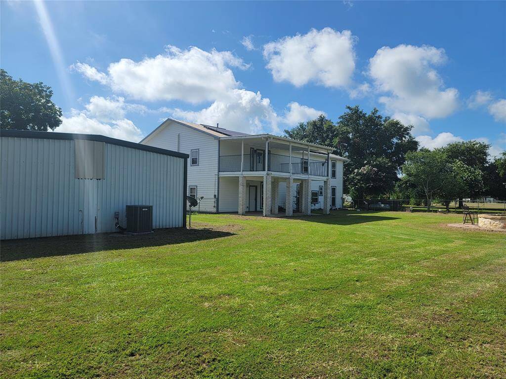 View from immediate back yard of main home and apartment/guest house proximity.