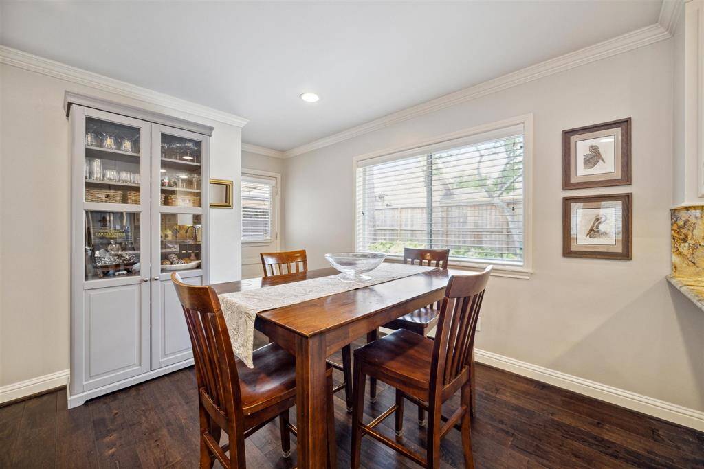 Stainless appliances and recessed lighting in this luxurious chefs kitchen