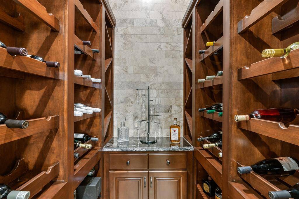 Intimate wine grotto for entertaining or personal collection.
