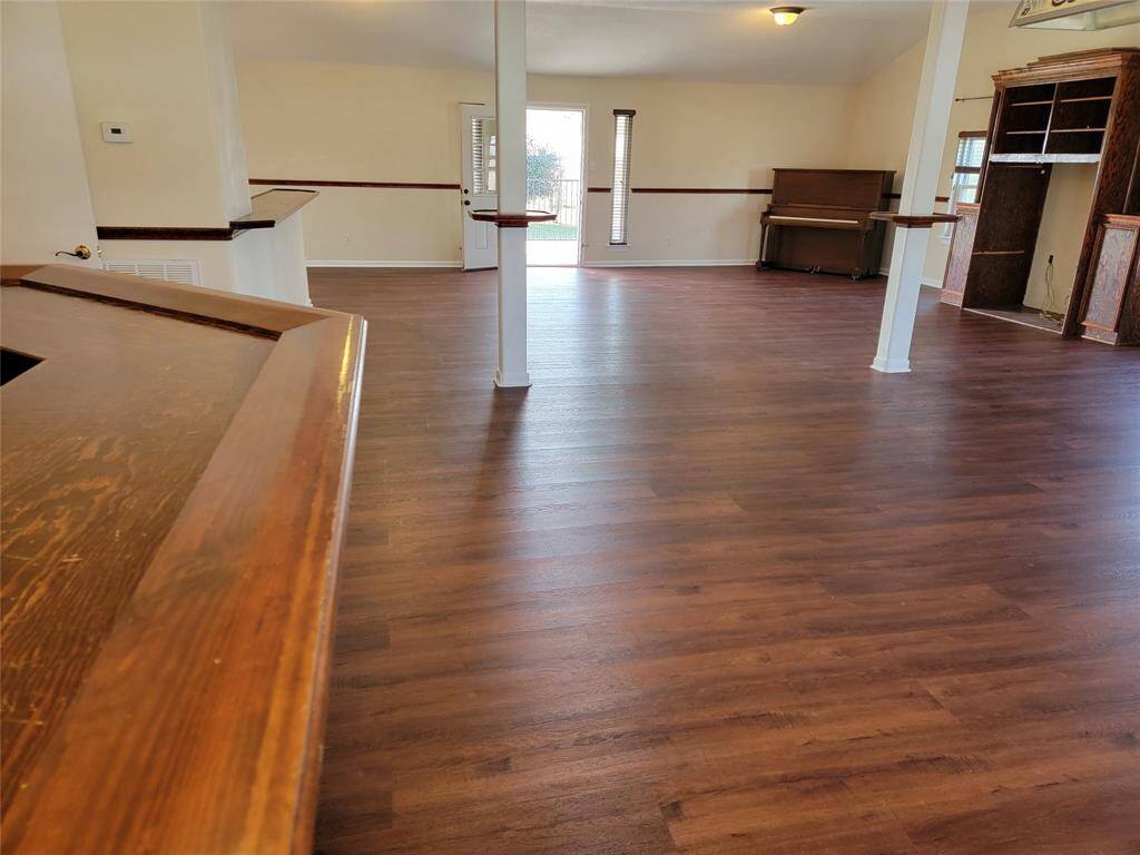 View from bar area towards balcony exit.