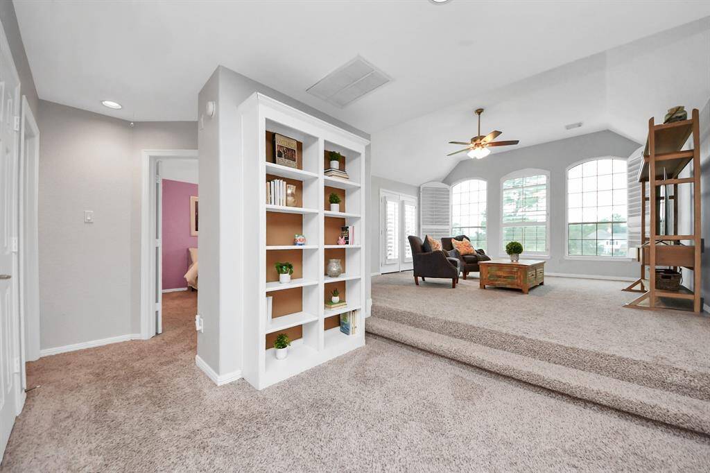 Nice built-in shelf for books or games.