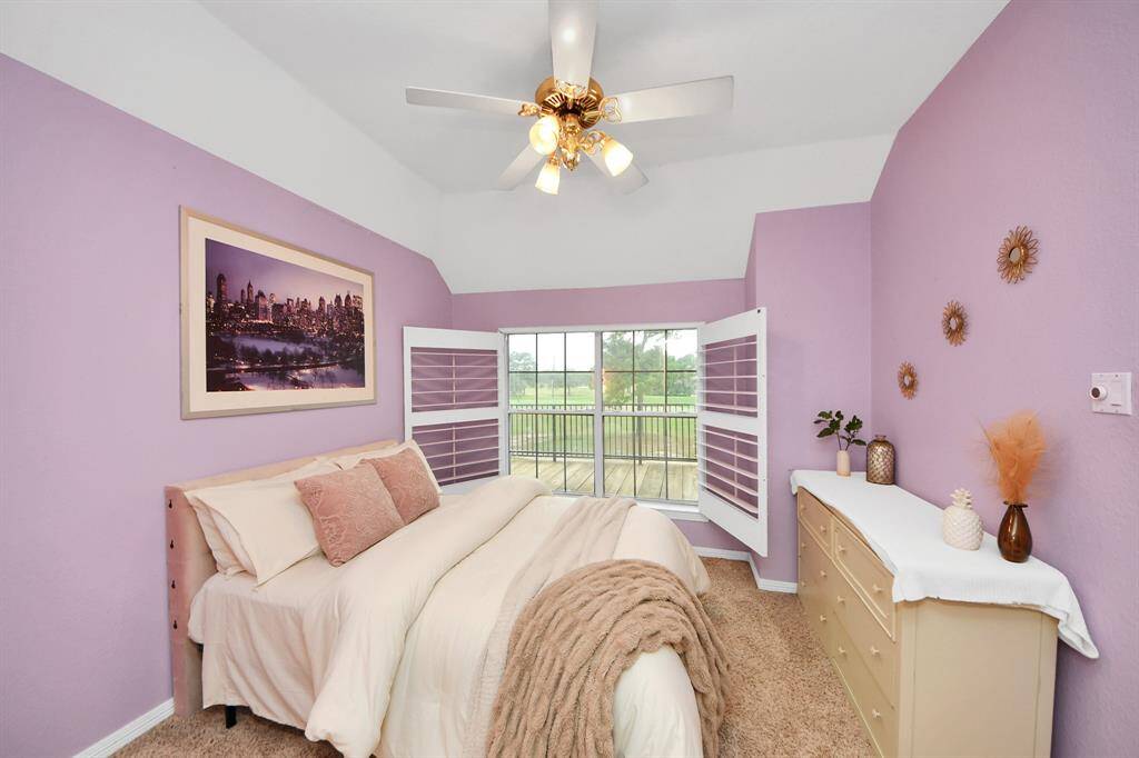One of three bedrooms, this one has nice views of the golf course.