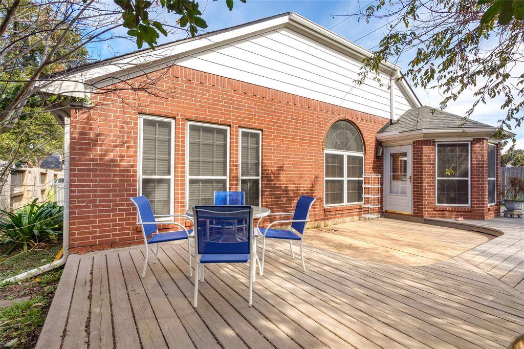 Step into the backyard, where you'll find a charming sitting area, ideal for outdoor gatherings or peaceful relaxation. The space provides a great foundation for you to create your perfect outdoor escape, whether it’s a garden, lounge area, or your own personal haven.
