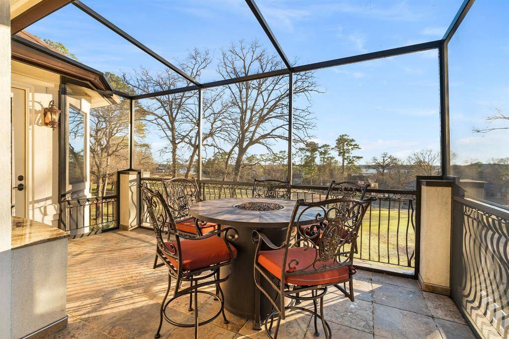 Screened-in balcony with stunning views and privacy.