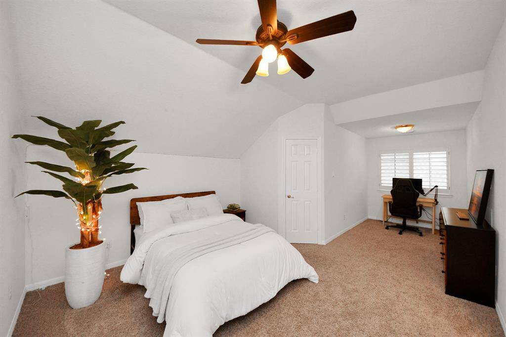 This unique second bedroom has so many options for furniture placement.