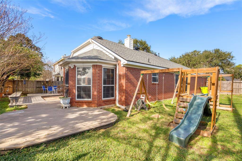The backyard is spacious enough to accommodate a playground, making it the perfect spot for kids to play and explore. With plenty of room for outdoor fun, it offers endless possibilities for family activities, gardening, or creating your own private oasis.