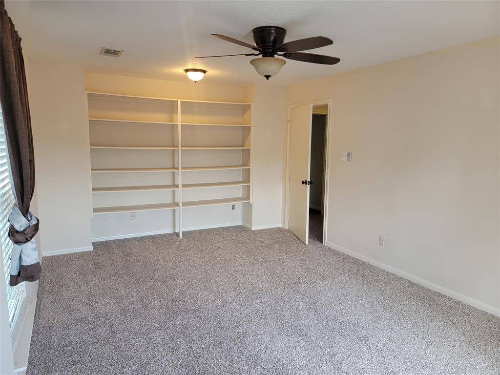 One of 6 bedrooms/office/media rooms at second floor.