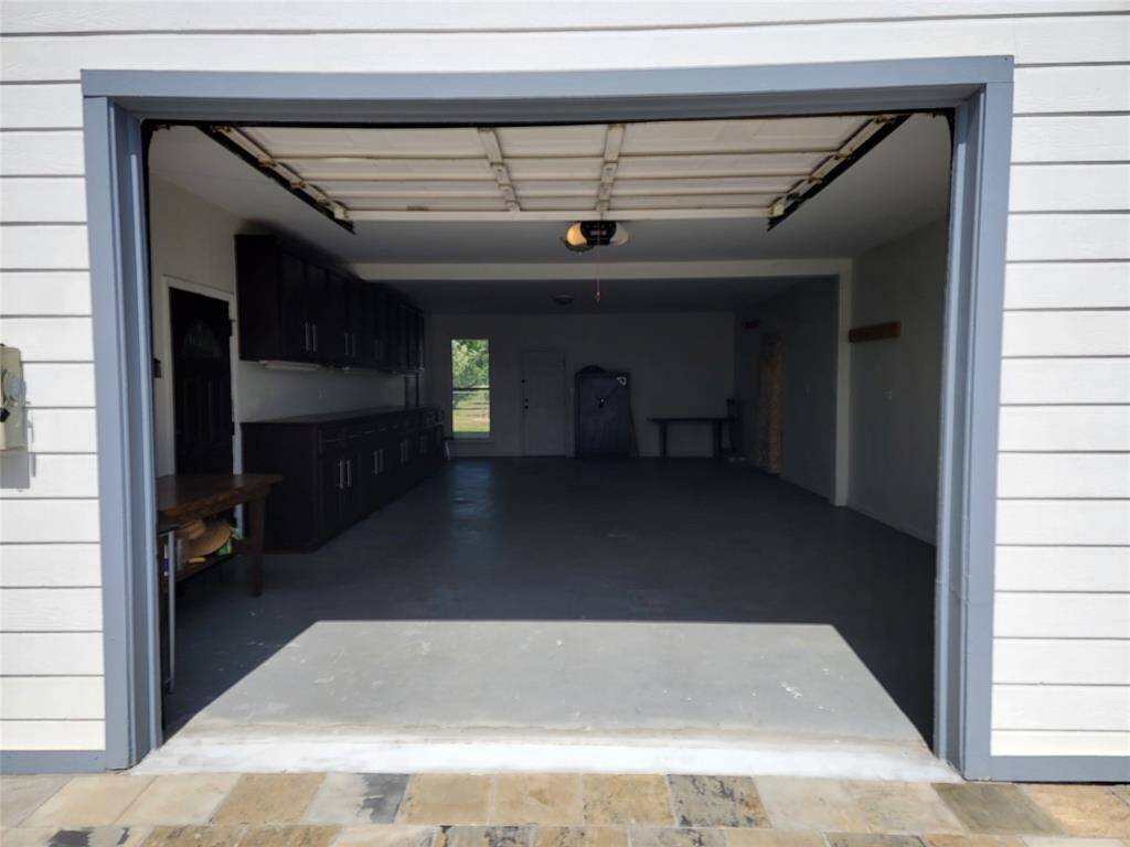 Entry at attached garage.