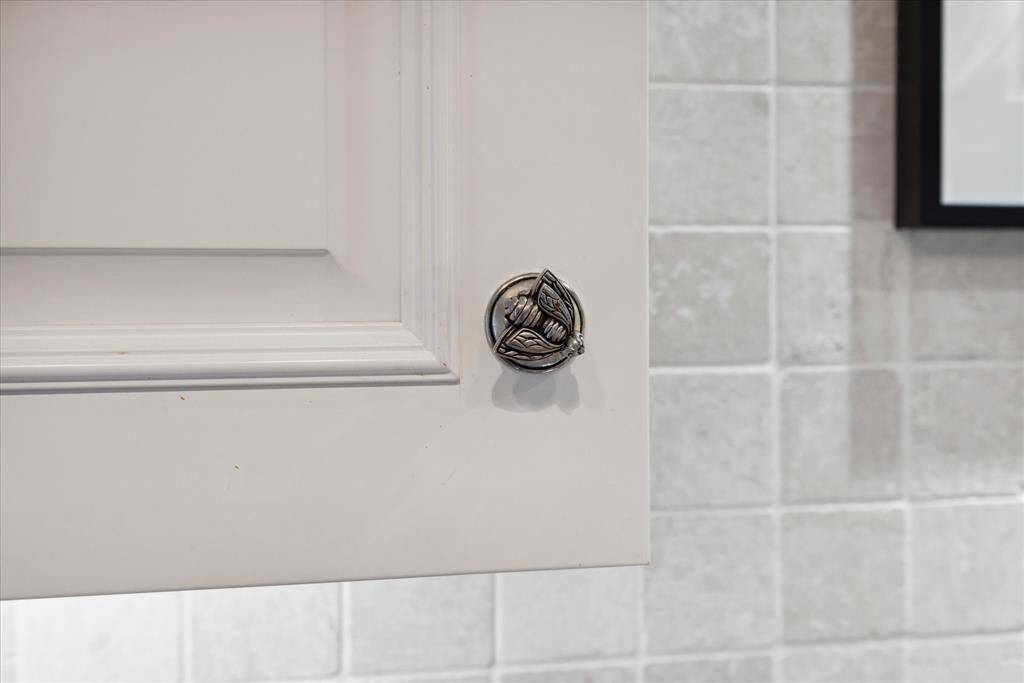 Note the stunning pulls on cabinets.