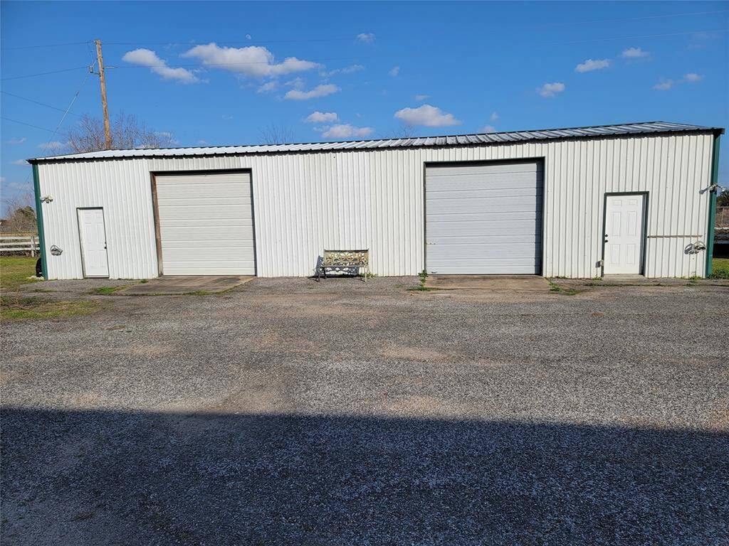 Workshop with larger entry at 10' Height by 9' Width. Building is 60'x22'.