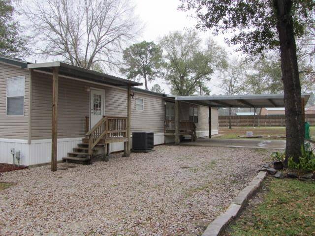 Carport back side of home